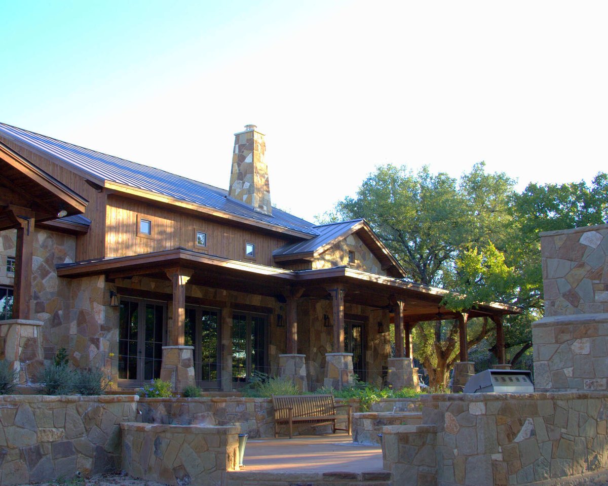 Custom stone exterior of a luxury home built by J Bryant Boyd in Georgetown, TX