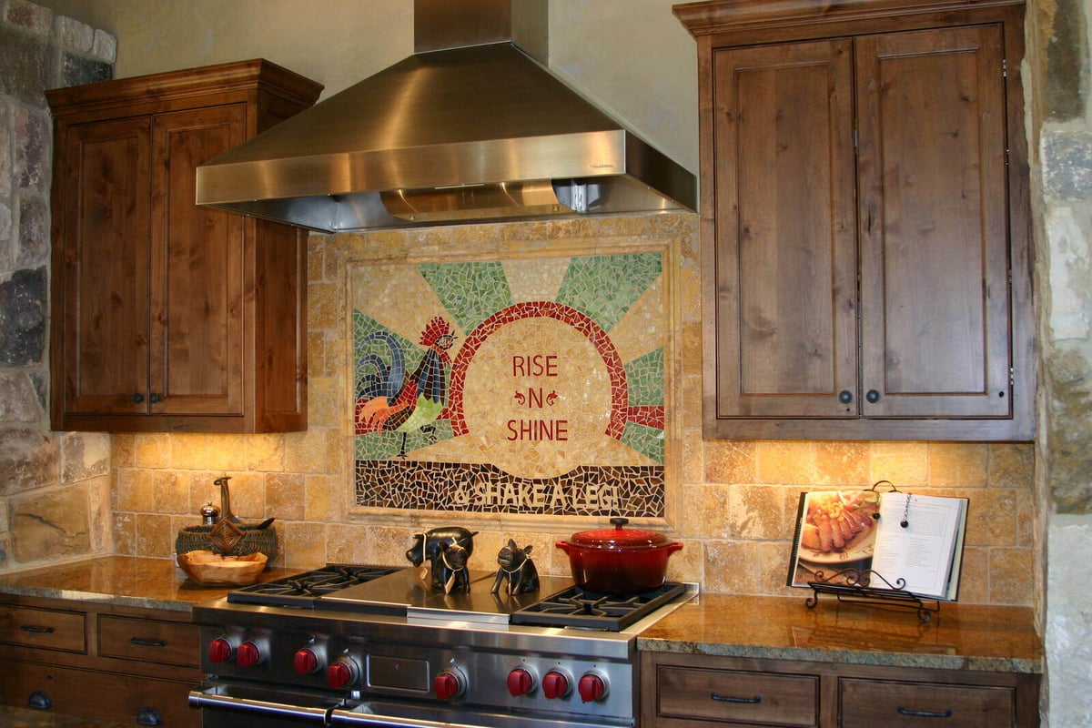 Kitchen backsplash with colorful mosaic tile in a custom home by J Bryant Boyd in Georgetown, TX