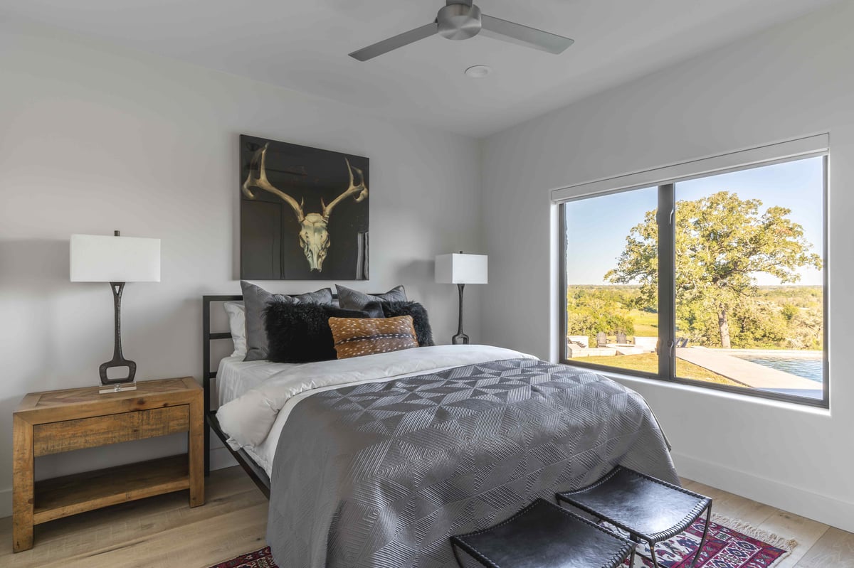 Modern Texas bedroom with large window | J Bryant Boyd