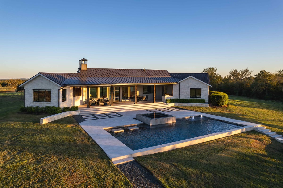 Modern front view of central Texas house with pool | J Bryant Boyd