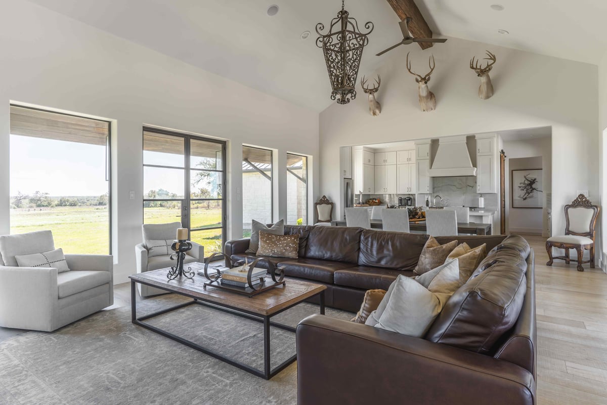 Natural light from large open windows in open concept living area | J Bryant Boyd