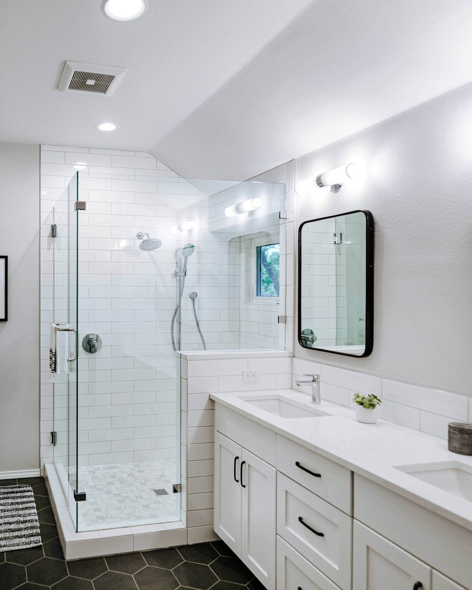 Elegant bathroom remodel with glass shower and double vanity in Georgetown, TX by J Bryant Boyd