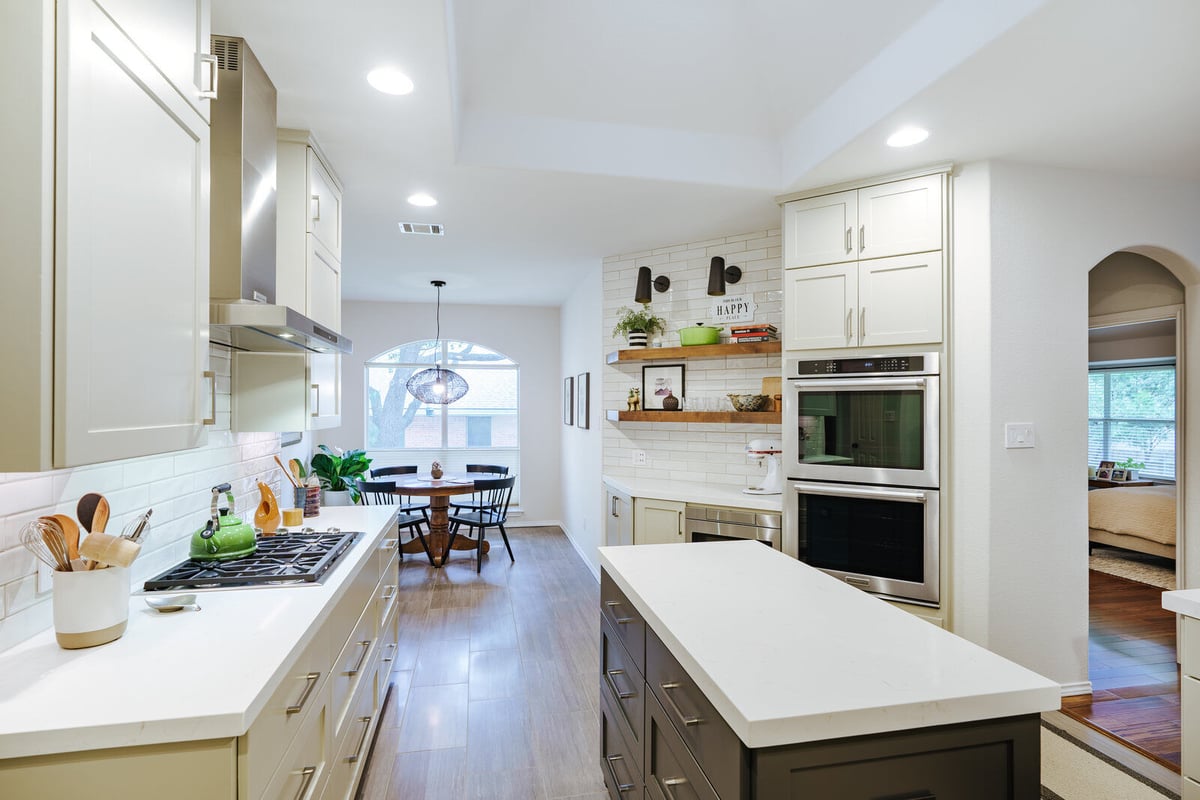 Spacious kitchen remodel featuring a large island and modern appliances in Georgetown, TX by J Bryant Boyd