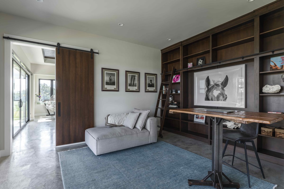 Office with stand up desk and barn door | J Bryant Boyd