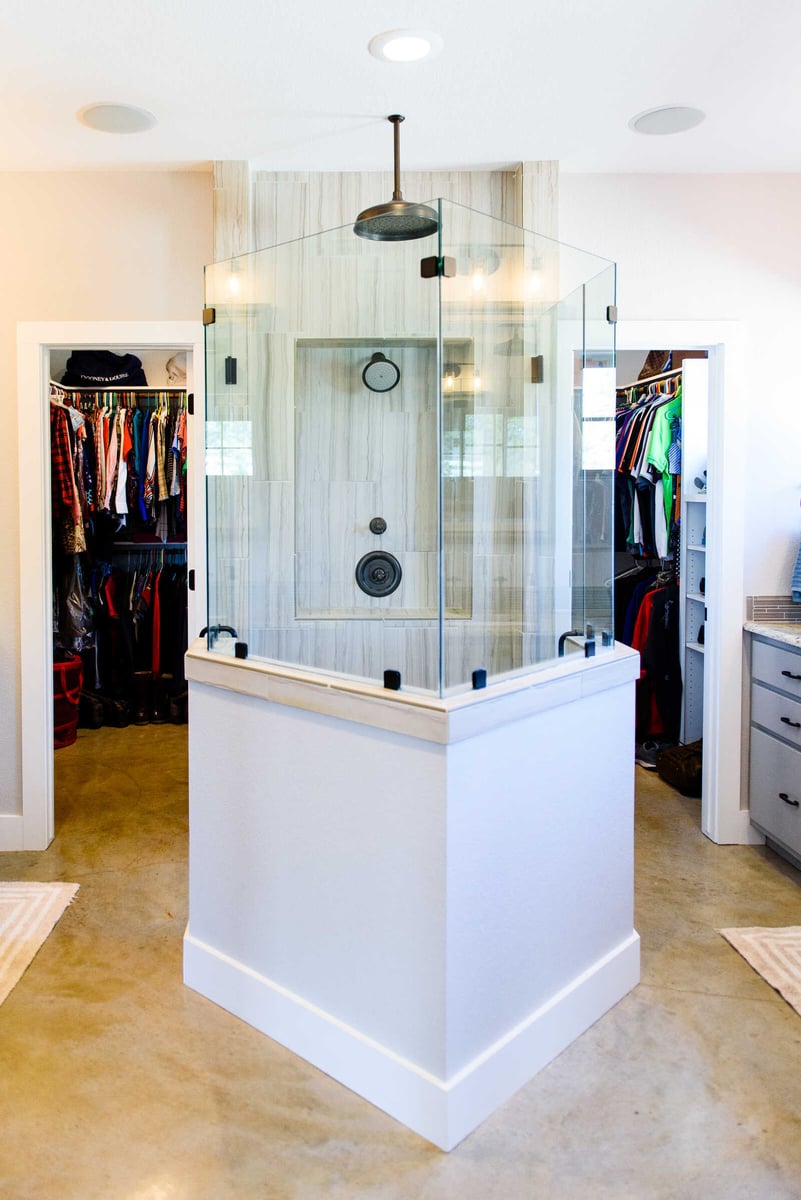 Custom walk-in closet with organized shelving in a Georgetown, TX home by J Bryant Boyd Design-Build