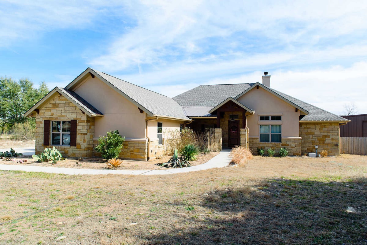 Full exterior view of a Georgetown, TX custom home by J Bryant Boyd