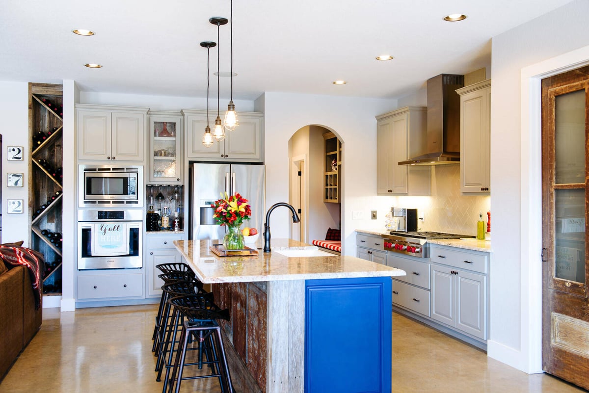 Spacious kitchen with custom cabinetry and modern appliances in a Georgetown, TX home remodeled by J. Bryant Boyd