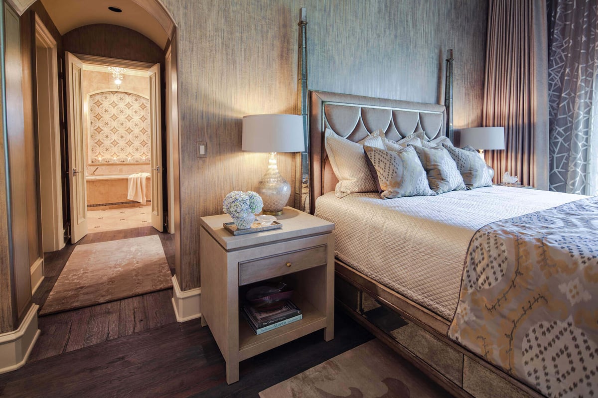 Luxurious master suite leading into a spa-like bathroom in a custom home by J Bryant Boyd in Georgetown, TX