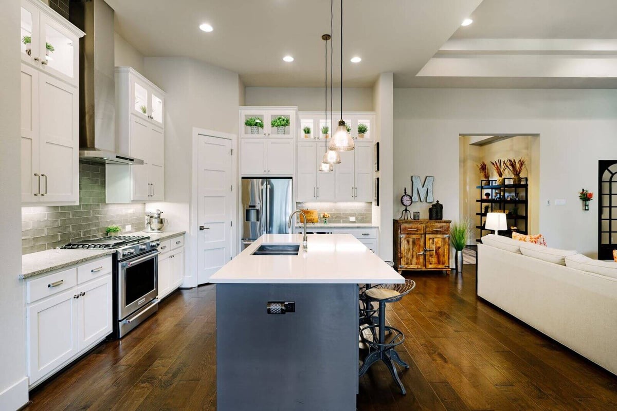 Elegant kitchen and living room in a custom home by J Bryant Boyd, Georgetown, Texas