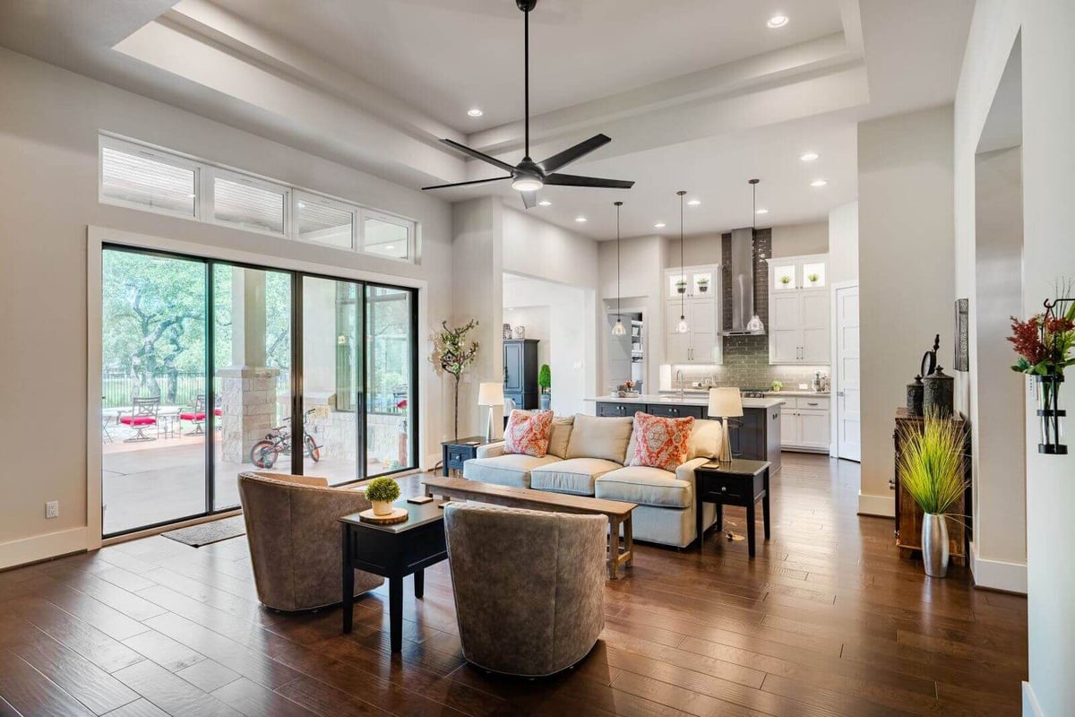 Open-concept living and kitchen area in a custom home by J Bryant Boyd, Georgetown, Texas