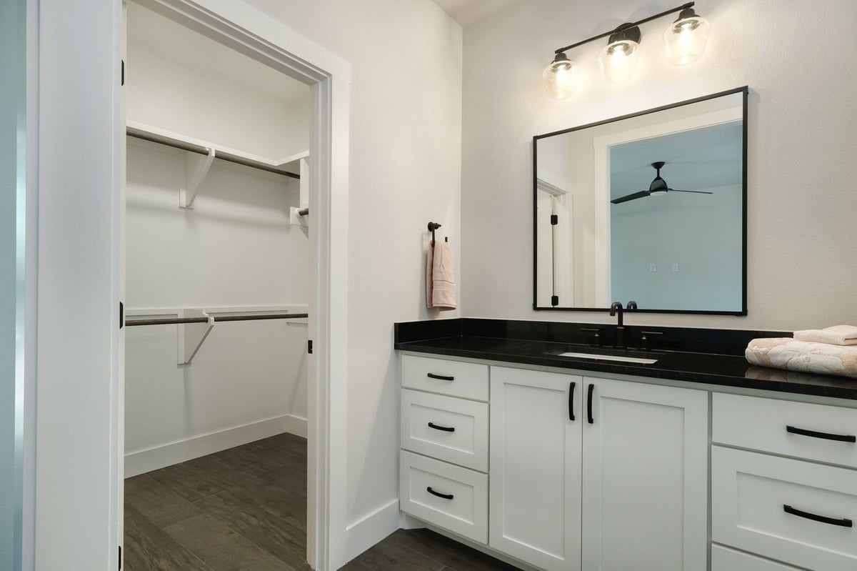 Contemporary bathroom with white tiled shower by J Bryant Boyd in Georgetown, Texas
