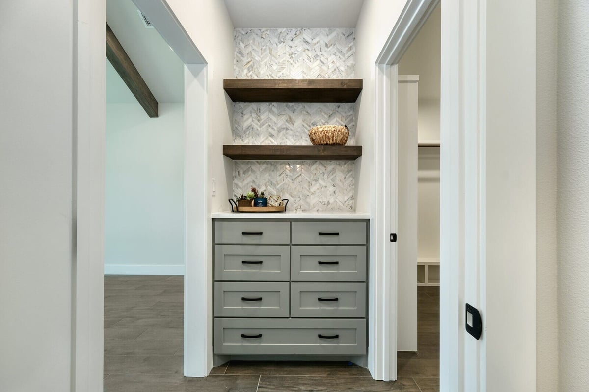 Hallway niche with built-in shelves and drawers by J Bryant Boyd in Georgetown, Texas