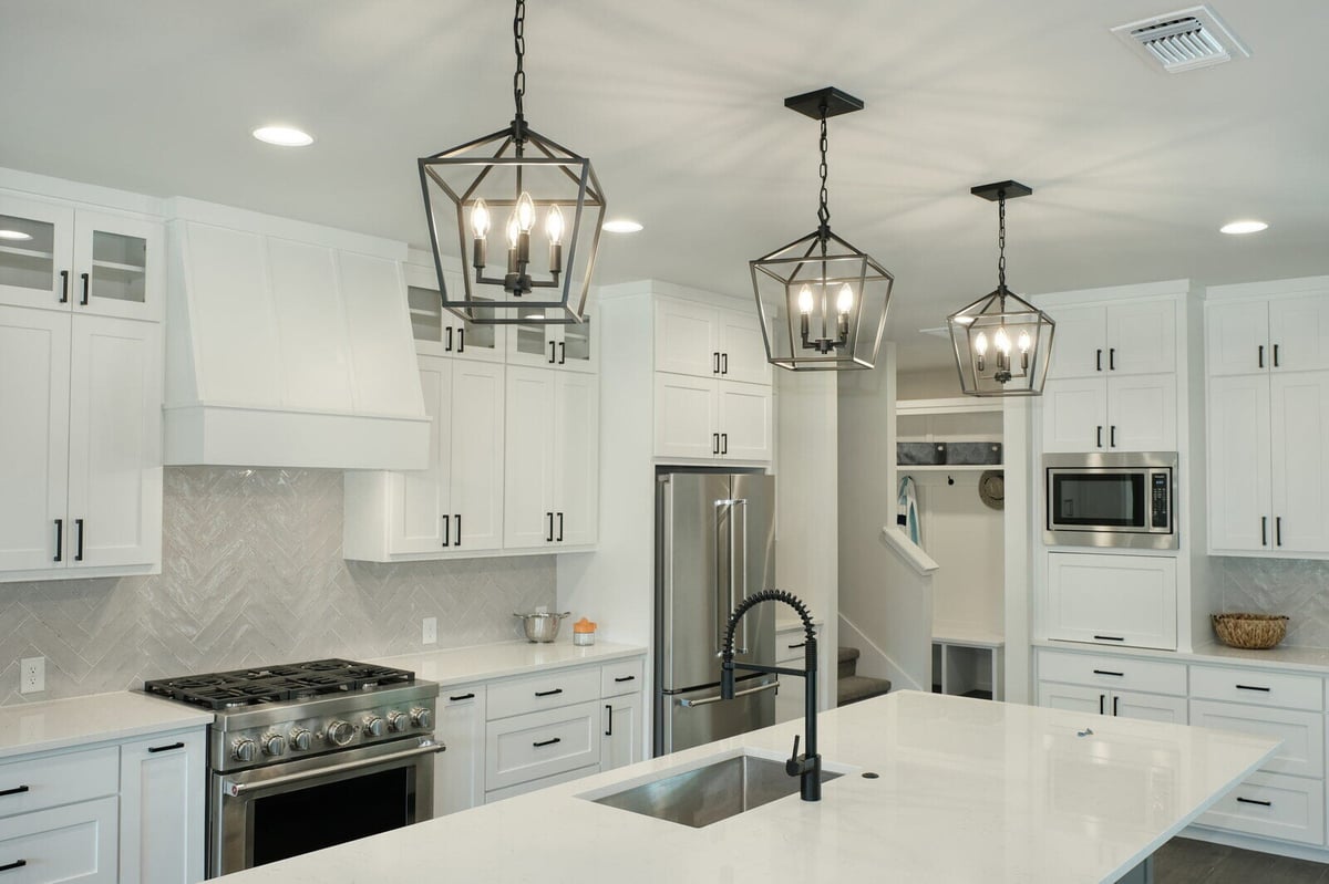 Modern kitchen with pendant lighting by J Bryant Boyd in Georgetown, Texas