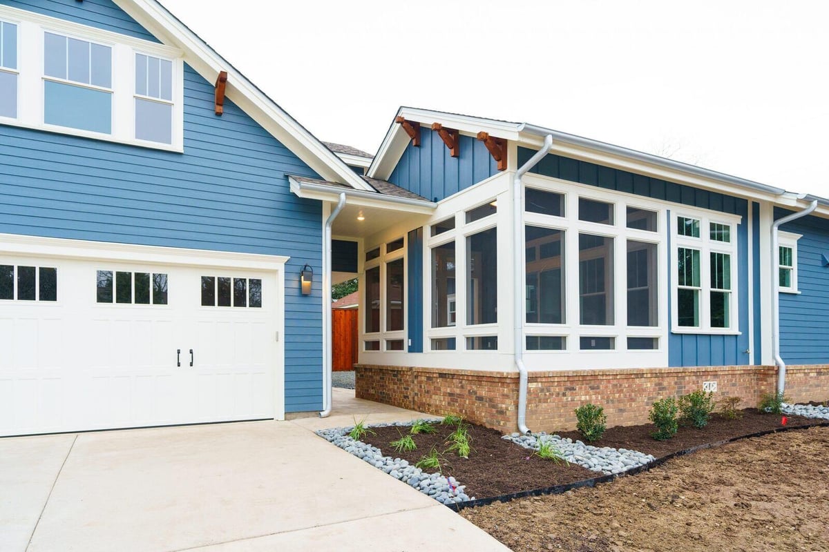 Custom home exterior with attached garage in Georgetown, Texas, by J Bryant Boyd