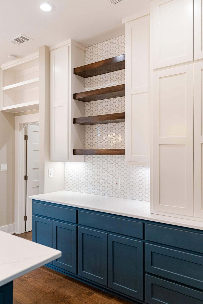 Kitchen with open shelves and hexagon tile backsplash in Georgetown, Texas, by J Bryant Boyd