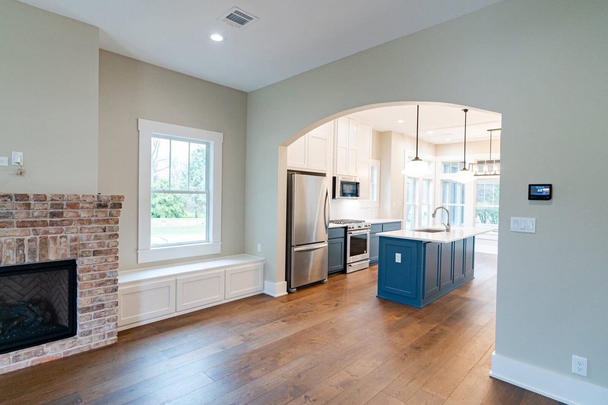 Open kitchen and living space in a custom home by J Bryant Boyd in Georgetown, Texas