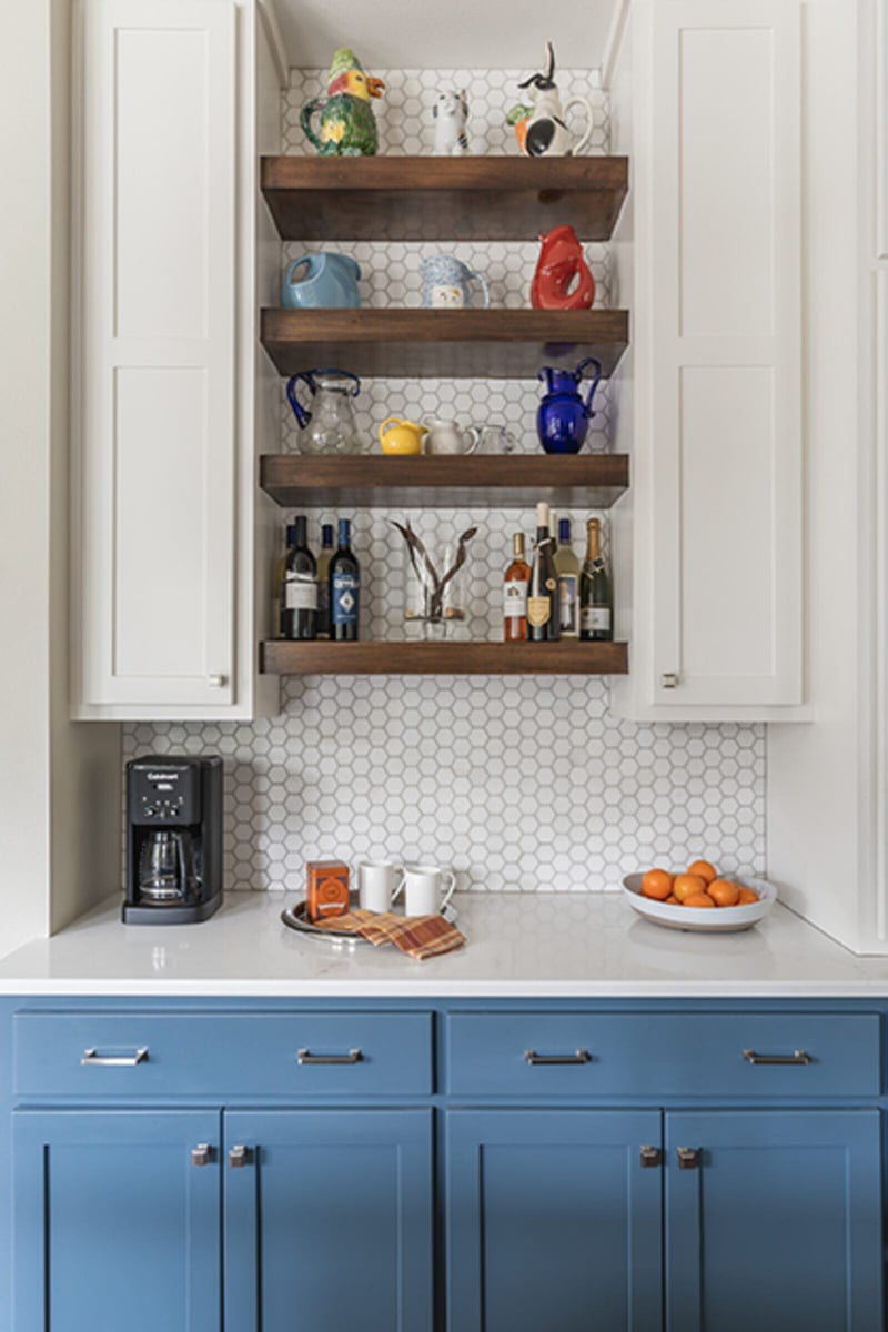 blue and white cabinets with open shelving j bryant boyd georgetown tx