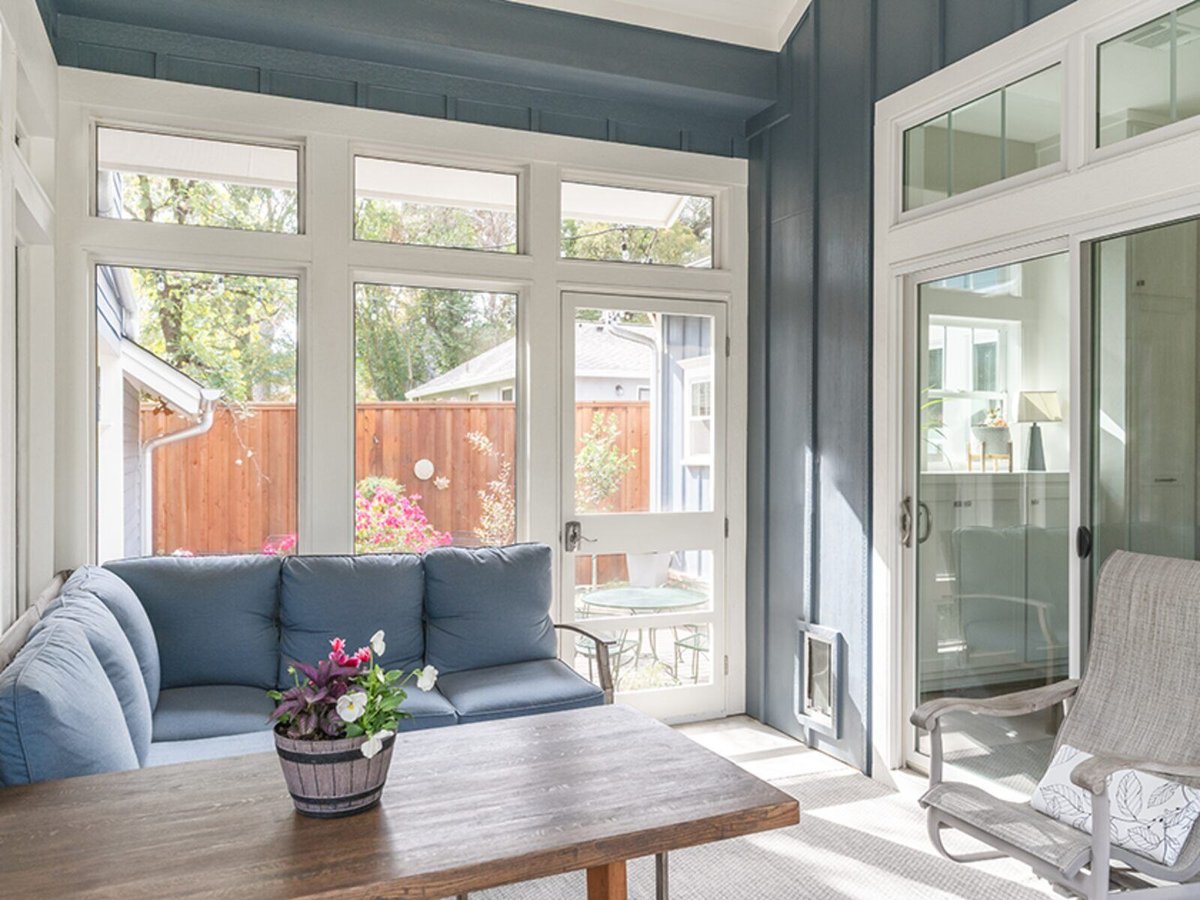sunroom with windows and couches j bryant boyd georgetown tx