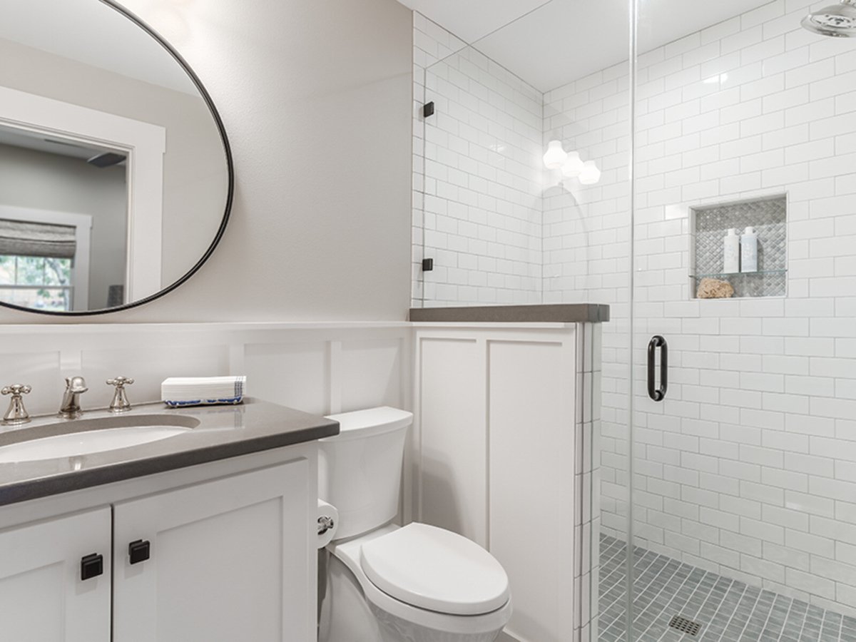 white custom bathroom with subway tile in shower j bryant boyd georgetown tx
