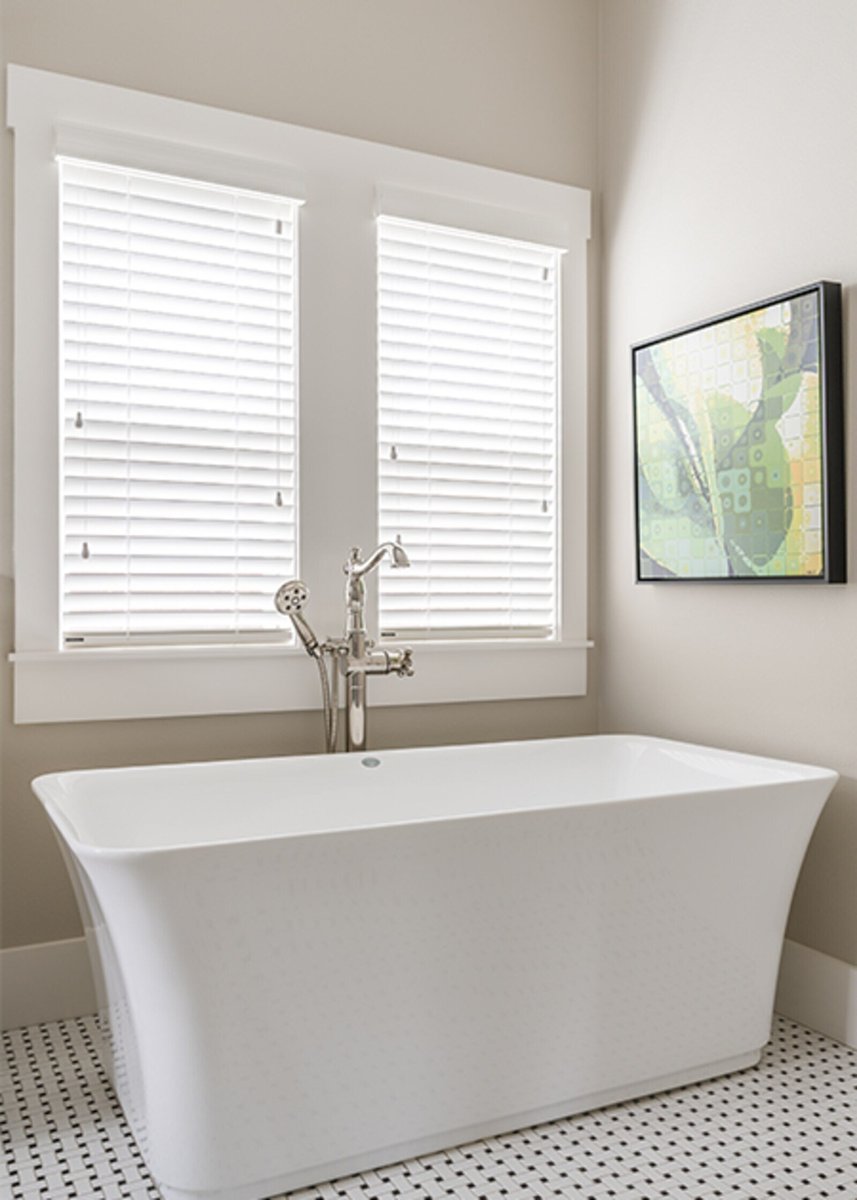 white freestanding tub with window in bathroom j bryant boyd georgetown tx